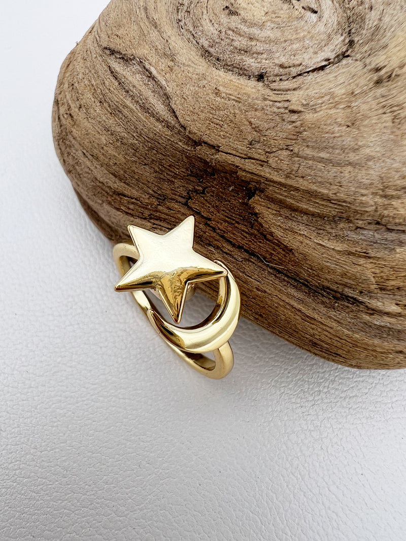gold fidget ring with spinning star and moon