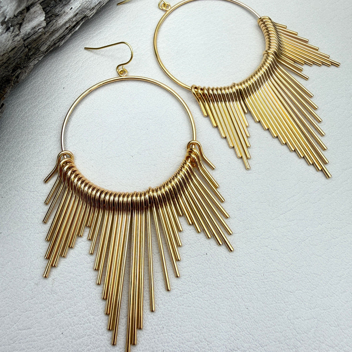 hoop earrings with golden sun beam rays