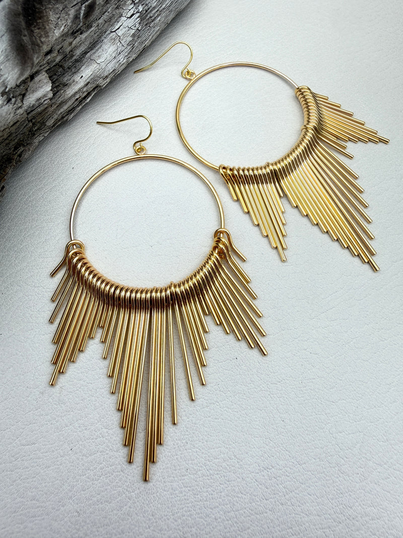hoop earrings with golden sun beam rays