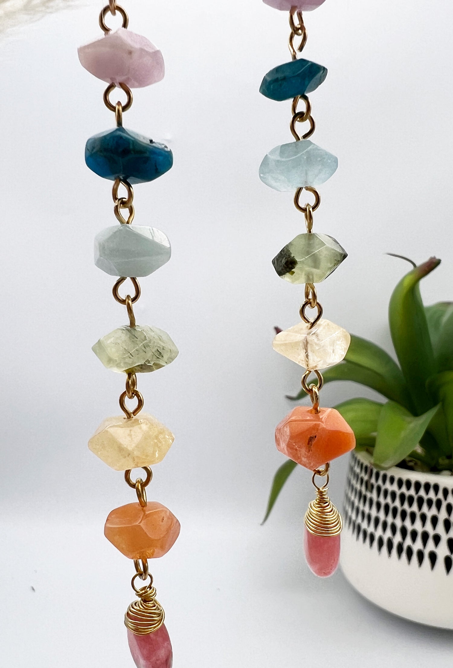 Gold chakra earrings with genuine kunzite, apatite, aquamarine, prehnite, citrine, carnelian, and watermelon quartz. 4” long, handcrafted for balance and energy.