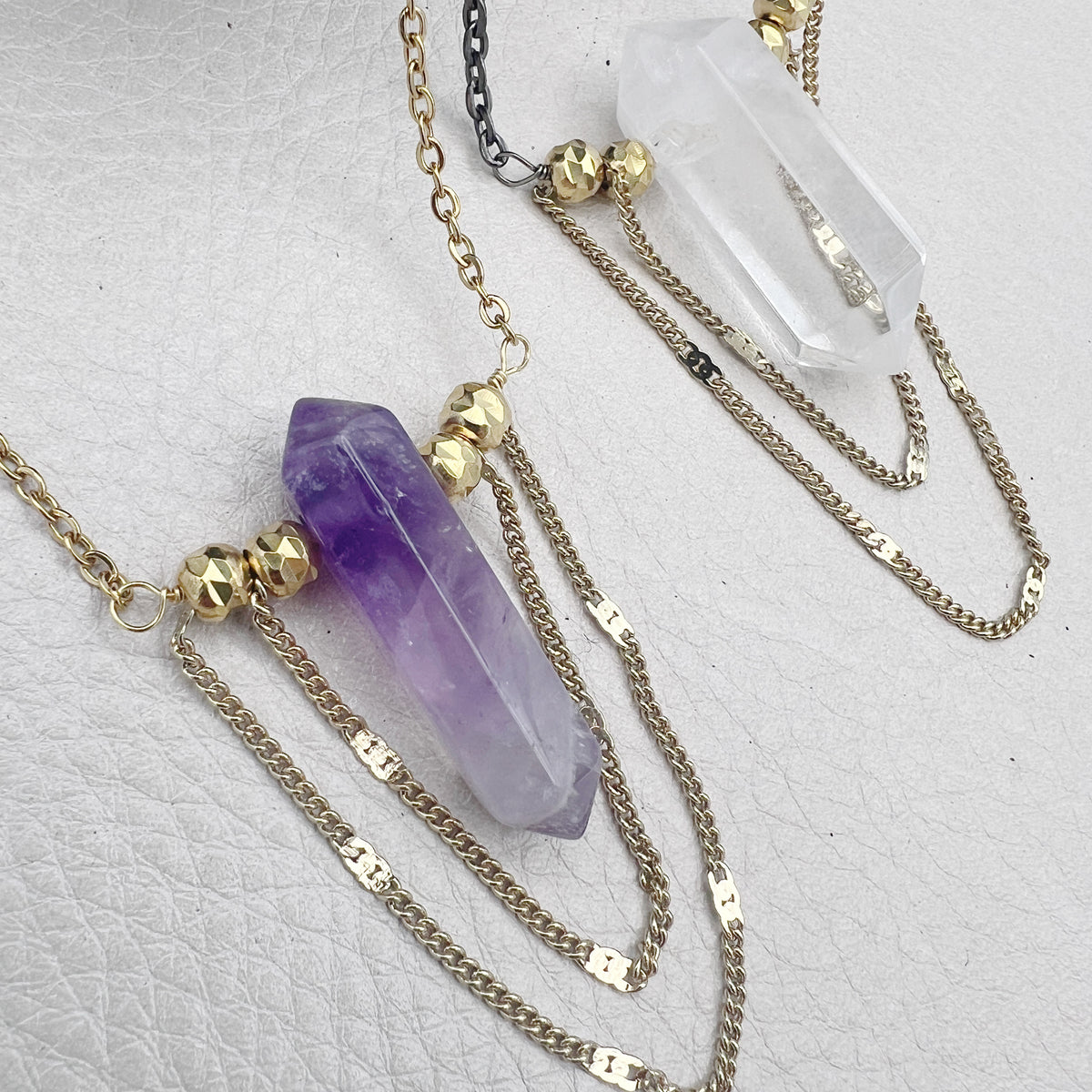 Statement gemstone necklace with amethyst or quartz, brass bead details, and gold or black stainless steel chain. Waterproof and tarnish-resistant.