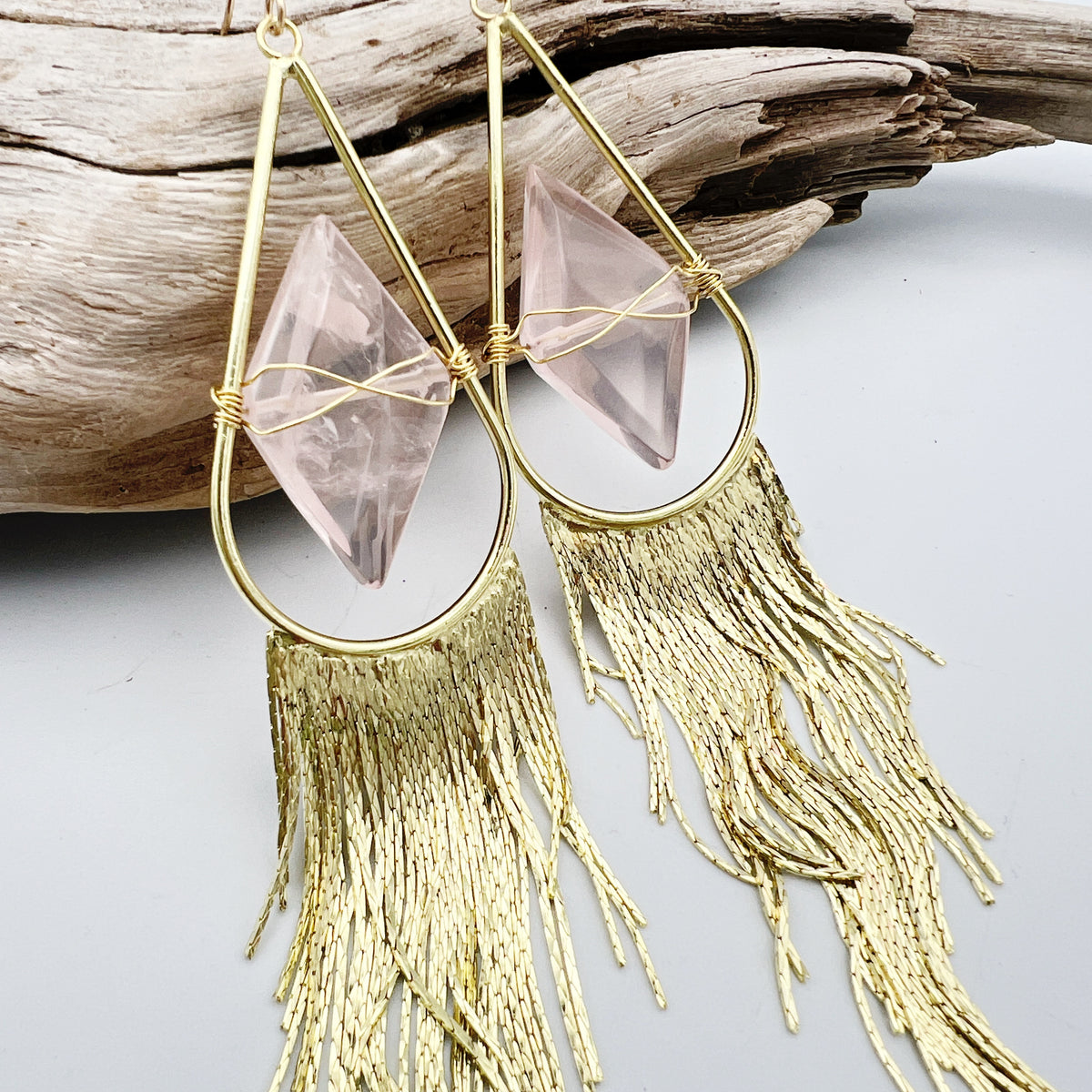 Fringe earrings with wired rose quartz and gold 
tassels. Statement design with 14k gold-filled ear wires, lightweight yet bold.