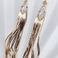 Long gemstone fringe earrings with gold or silver tassels, featuring moonstone. Lightweight and shimmering.