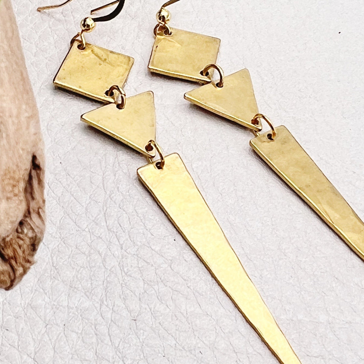 golden boho earrings with geometric shapes 