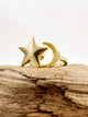 gold fidget ring with spinning star and moon