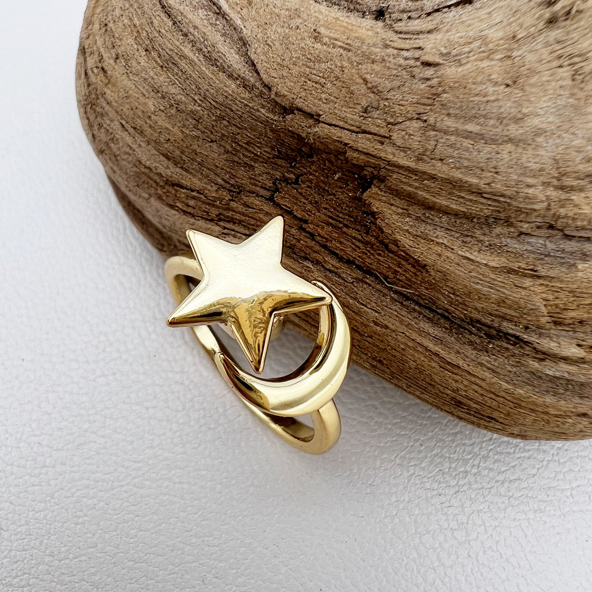 gold fidget ring with spinning star and moon
