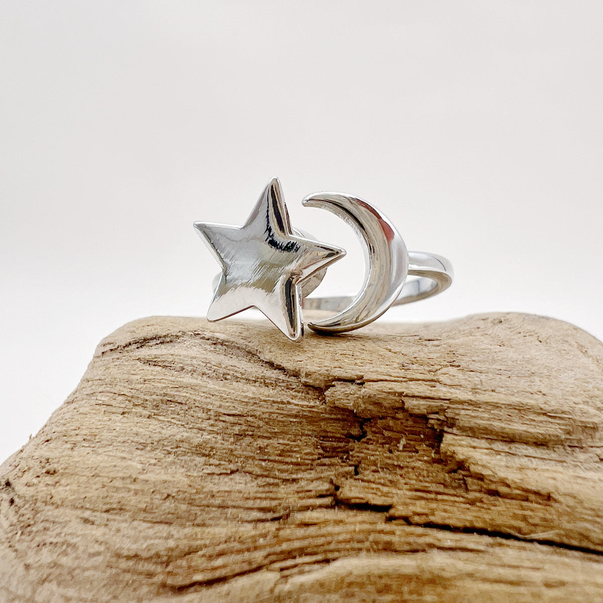 gold fidget ring with spinning star and moon