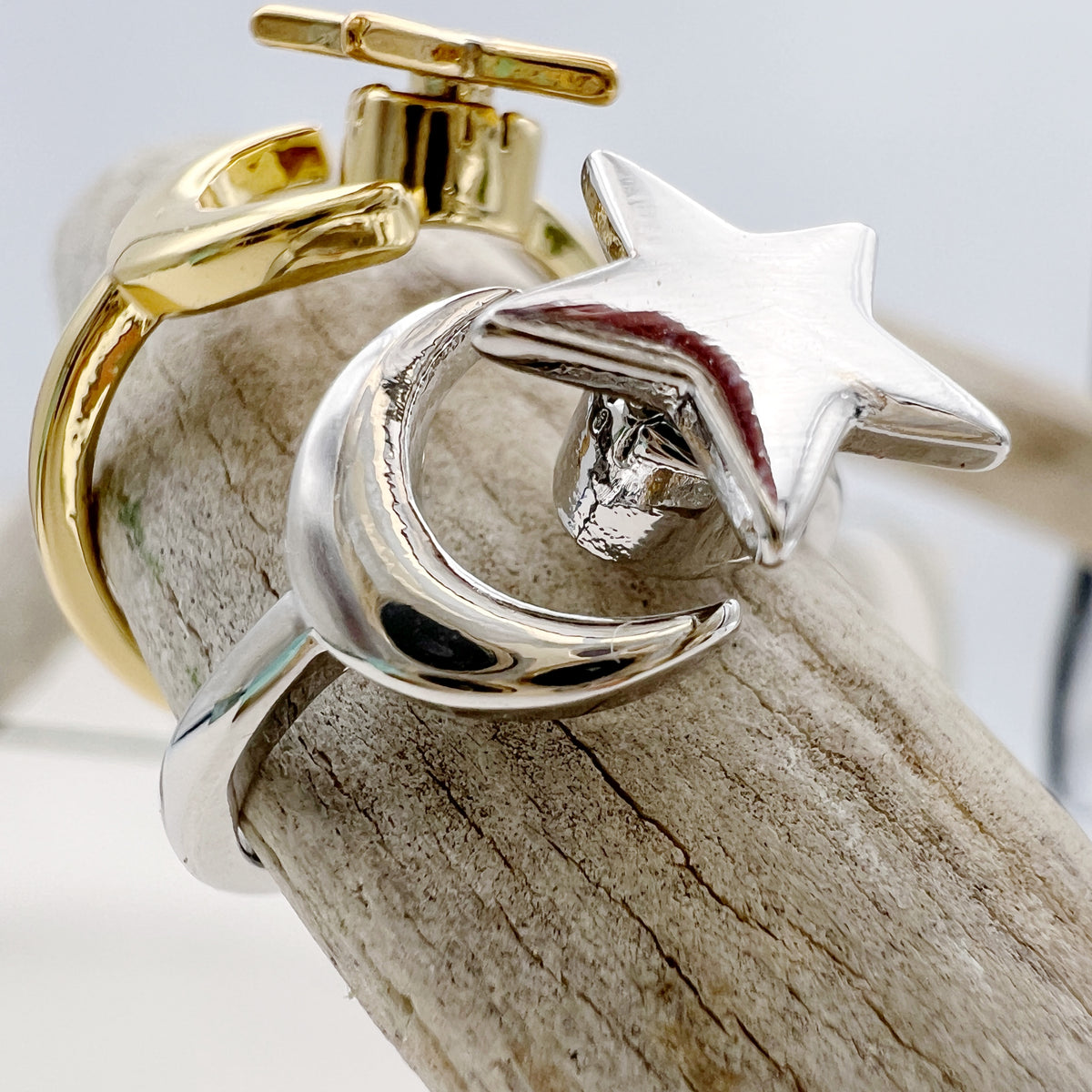 gold fidget ring with spinning star and moon