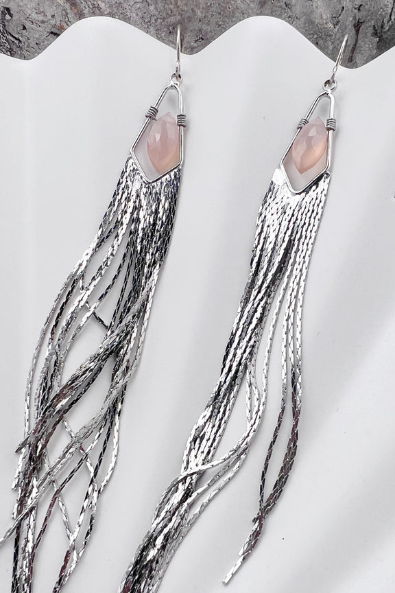 Long gemstone fringe earrings with silver tassels, featuring pink opal. Lightweight and shimmering.