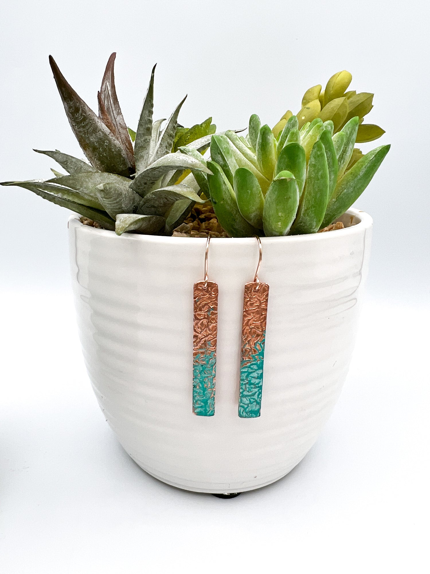 copper earrings dipped in turquoise by real to the roots