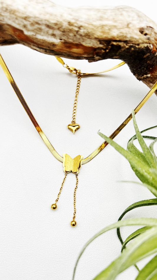 18k gold-plated stainless steel necklace with a butterfly charm, representing the thyroid and transformation. Adjustable 16” chain with 2” extender.